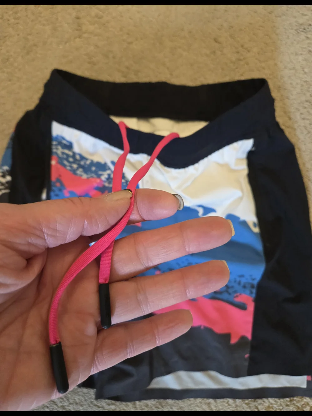 chubbies Black Swim Trunks with Blue, Pink and White Graphic Panel